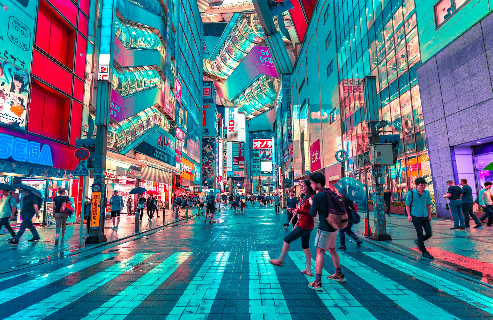 Neon-lit street in Asia at night — staying connected while travelling